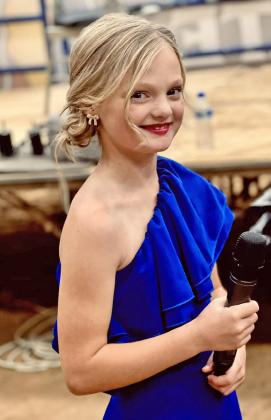 HOMETOWN TALENT At only 8, Laiken Brock, daughter of Taylor and Marissa Brock of Silverton, hopes to be selected to sing the national anthem at this year’s National Finals Rodeo in Las Vegas. | KODIE FAIRCHILD