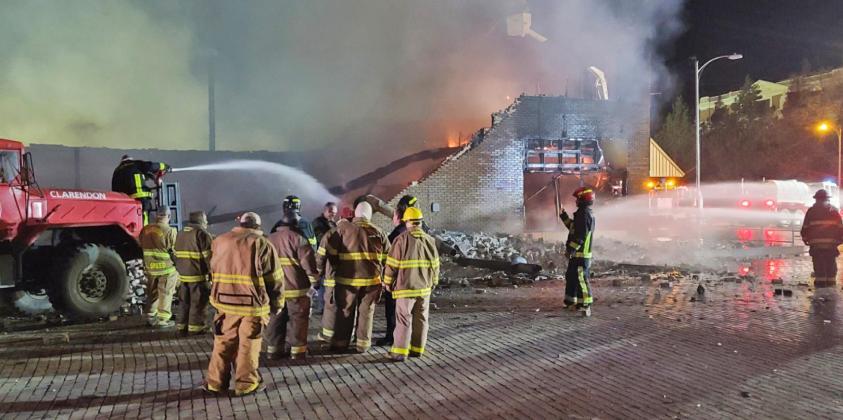 MAIN STREET BLAZE More than half a dozen area fire departments helped contain a fire that broke out in an abandoned building in downtown Memphis, Texas, Feb. 21. | TORI MINICK, TURKEY VFD