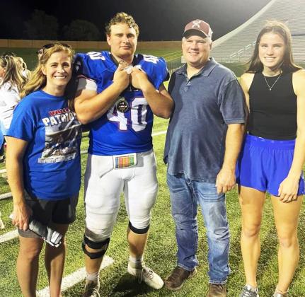 VALLEY ALL-STAR Tucker Schlueter, shown here with his family, represented the Valley Patriots at the TSMCA All-Star Game Saturday in Wichita Falls. He played for the West team, which defeated the East team 68-22. | COURTESY PHOTO