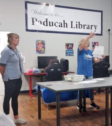 PADUCAH LIBRARY SUMMER READING The second Summer Reading day at the Bi-Centennial Public Library featured the United States Post Office in Paducah. They taught everyone about ZIP codes, addressing envelopes, preparing items to send, and other mailing matters. The USPS staff are an important and essential part of a thriving community. Paducah children are learning that the summer reading theme of “All Together Now” includes members of our community that improve the quality of our lives. | COURTESY PHOTOS
