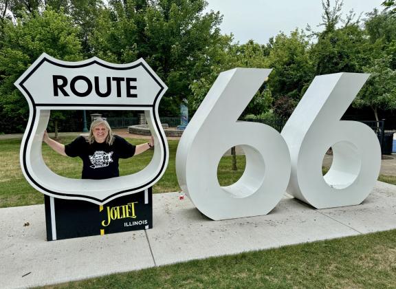 WISHYOUWERE HERE Postcard and photo props—like this one in Joliet, Illinois—abound all along the 2,448 miles of historic Route 66 from Chicago to Los Angeles. | CAPROCK COURIER