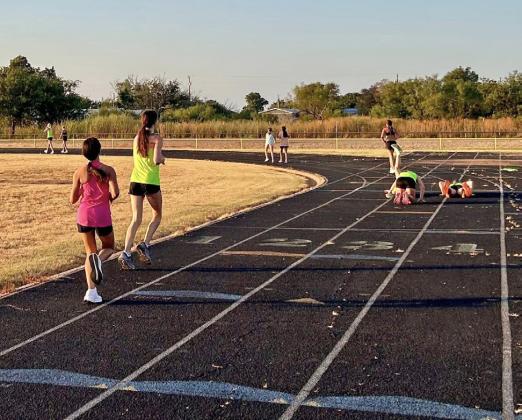 A NEW SEASON Monday morning at Jack Huey field in Guthrie the Lady Jags XC team and Jaguar football team kicked off the athletics season. | COURTESY PHOTOS