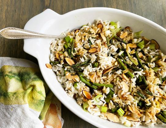 DRESS IT UP Additions to this dish that are readily available in your pantry or crisper will combine with the rice and toppings to make a phenomenal side dish for backyard barbeques, | ANGELINA LARUE PHOTO