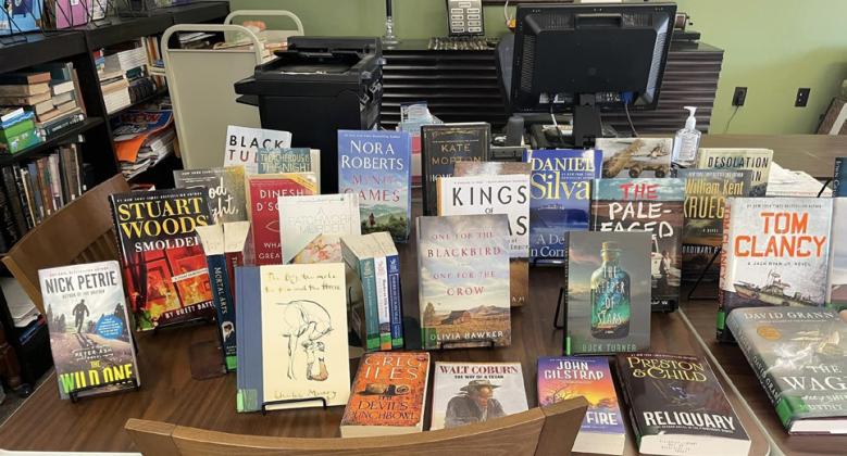 ONTHESHELVESANDDISPLAYSPACES of the elegantly appointed Silverton Public Library—situated in a renovated historic building on the Briscoe courthouse square—are new reading materials purchased via a 2024 grant from theTocker Foundation. | COURTESY PHOTOS