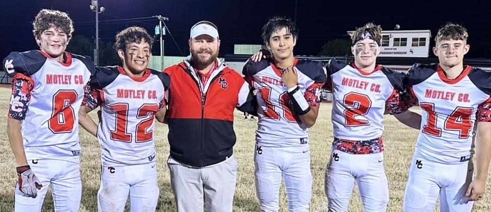 MOTLEY SENIORS Senior players have anchored this year’s playoff-bound Motley County Matadors. Shown with head coach Mike Bigham are #6 Ayden Roys, #12 Kadyn Roys, #10 Bubba Quilimaco, #2 AidanTaylor and #14 Kody Cates.The Matadors face the Benjamin Mustangs in the playoffs Friday night in Matador. | COURTESY PHOTO