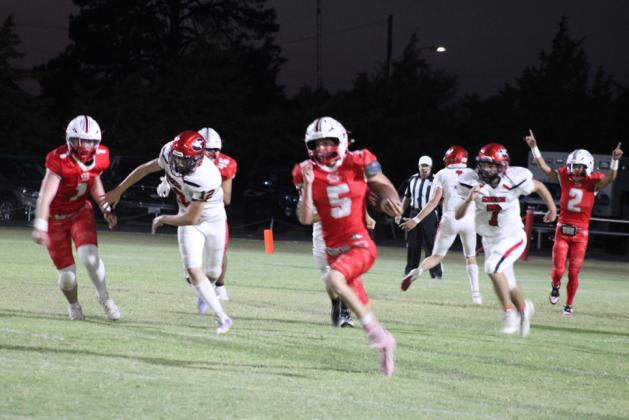 CAGLEOUTRUNSTHETIGERS Slayton Cagle ran all over theTigers Friday night, Oct. 3, scoring several touchdowns for the Owls. | COURTESY PHOTO