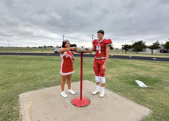 2025 MR AND MISS FLAME Seniors Cooper Mullins and Natalia Deleon lit the flame before the Homecoming game in Silverton on Friday. | COURTESY PHOTO