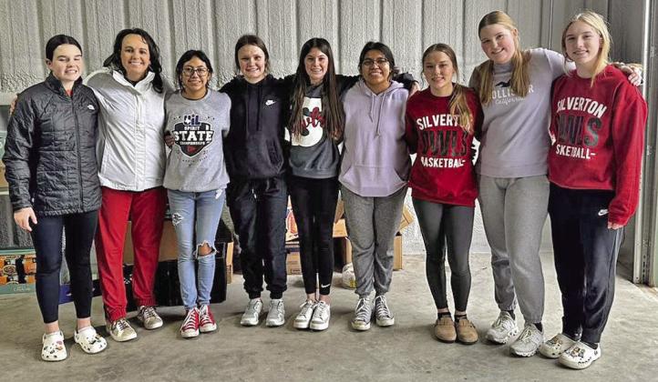 HELPING OUT The Silverton girls basketball team helped out last week with High Plains Food Bank distribution atTri-County Meals in Quitaque. | COURTESY PHOTOS