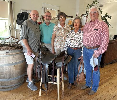 SCHWEITZER GRANDSONS Randy Moss (left) and Michael Schweitzer, along with Randy’s wife, Marnell, and Motley County historians Marisue Potts Etheredge and Rusty Etheredge all played a part in the inspiration to showcase H.H. Schweitzer’s legacy at the Hotel Matador. | COURTESY PHOTO