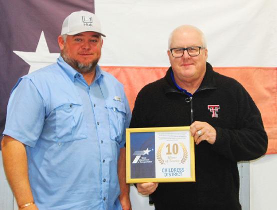 MOTLEYCOUNTY ScottFuiton,maintenance supervisor with Darwin Lankford.