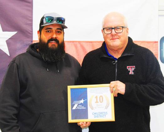 COTTLE COUNTY Tim Martinez, district sign technician with Darwin Lankford
