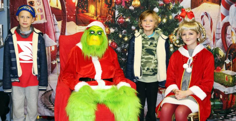 MOTLEY LIBRARY CHRISTMAS The Grinch and Cindy Lou Who visited the Motley County Library on Thursday for a fun-filled evening during the annual Christmas at the Library event. | COURTESY PHOTO