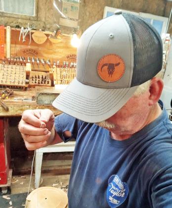 CUSTOM CRAFT Will Burgess, above, learned to make saddles from masters like Tooter Cannon of Dickens. To date, he's turned out a total of 364, at an average of 15 saddles per year; orders require a year's lead time. A custom Burgess saddle will go to theTop Hand at this year’s Motley-Dickens Old Settlers Rodeo. | COURTESY PHOTOS