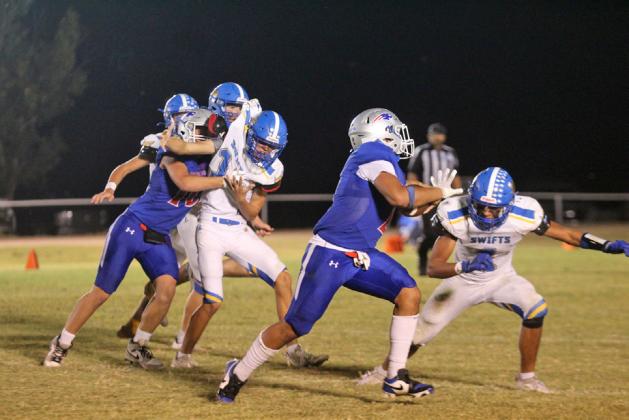 ABLOCKANDARUN Tripp Carlisle lands a solid block for Damian Valdes as he runs for a touchdown against the Nazareth Swifts. | COURTESY VALLEY YEARBOOK