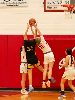 WHAT SPRAINED ANKLE? Maddie Francis outjumped a Lady Roo for a defensive rebound Friday night.