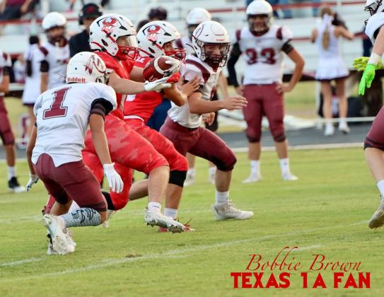 WET CONDITIONS on the field played havoc with the Owls’ best efforts, as the Vernon Northside Indians squeezes by them for the win Thursday night. | COURTESY PHOTO