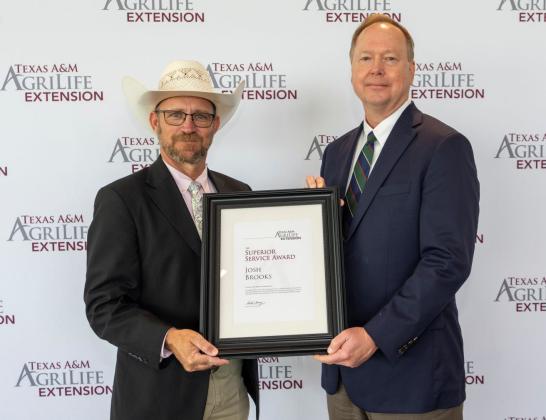 Distinguished Career, Middle Management award for his current role as District Administrator for the Panhandle District 1, a district covering 22 counties. | COURTESY PHOTO JOSH BROOKS of Hall County was recently awarded the