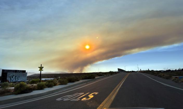 WILDFIRE INTHE MOUNTAINS The Summit Fire, which scorched thousands of acres in San Bernardino County, was allegedly started July 10 by the use of illegal fireworks, a county fire official told the Victorville newspaper.