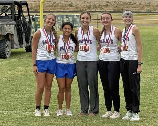 THE LADY PATRIOTS are Regional bound after placing third as a team at their district cross country meet in Guthrie Oct. 8. | COURTESY PHOTO
