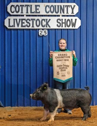 SWINE GRAND CHAMPION MCKINLEY MOORE