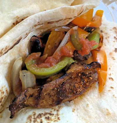 ’SHROOMS WITH A SIZZLE For a meaty-textured alternative in your favorite Mexican wrap, try Royal Trumpet mushrooms— though any variety will work in this healthy recipe. | ANGELINA LaRUE PHOTO