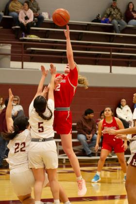 MADDIEFRANCISDRIVESTHE LANE past the Lady Horns as an offensive threat Friday Night.