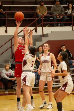BENTLEE GAMBLE SHORT JUMPER for two points against the Lady Horns early in the game Friday.