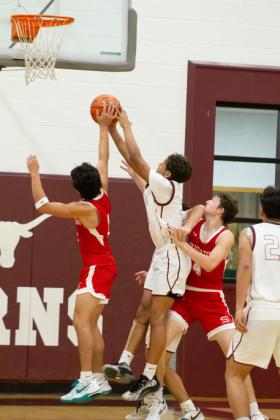 THAT’S A “NO!” from Zaden Ortiz, stuffing Longhorn attempting a two-point jumper Friday night.