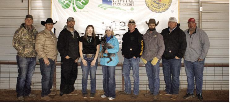 JOLEIGH DARSEY, THE WINNER OF THE 2025 MEMORIAL HERDSMAN AWARD, ALONG WITH THE MOTLEY COUNTY JR. LIVESTOCK SHOW BOARD. SHOWMANSHIP AWARDS