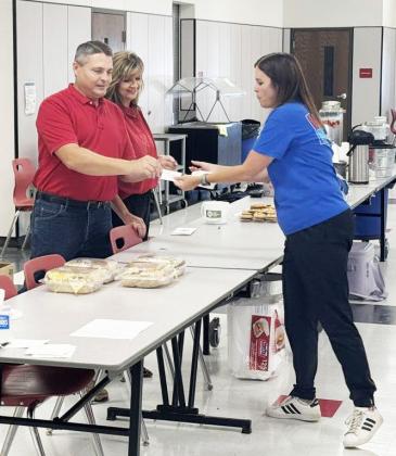 SUPPORTING TEACHERS Representatives of First National Bank Quitaque showed their support for Silverton ISD teachers and staff last week, as the new school year kicks off, by providing them lunch. | COURTESY PHOTOS