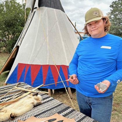 CAUGHT KNAPPING Knapper Sam Montandon of Canyon,Texas, will set up his colorful tipi at the 2025 Comanchero Rendezvous June 14 in Quitaque to entertain and inform guests about knapping, the ancient art of creating tools and points from flint. Several other educational displays will relive the colorful history of five counties along the Caprock. | COURTESY PHOTO