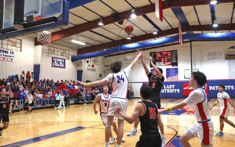IN PLAYOFF HUNT The Motley County varsity boys basketball team shown here taking on district rival Valley is well-positioned to make the playoffs this year. | SUNNI CATES PHOTO