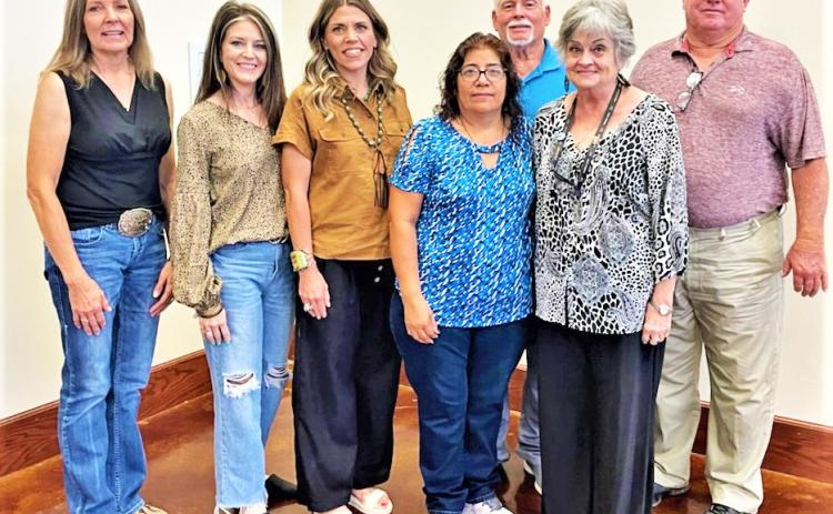 GUTHRIENEWSTAFF Guthrie Common School District welcomed new staff last week as a part of their in-service training. From left are Nancy Daniel, Tashya Carrillo, Melissa Everson, Maria Velasco-Ramierz, Jerry Arnold, Jill Edwards and Bobby Busby. | COURTESY PHOTO