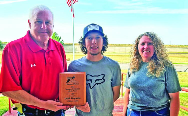 INTERN OF THE YEAR Caleb Ferguson (center) of Paducah was honored with a presentation by TxDOT Childress District staffers Darwin Lankford (left) and Shari Thomason (right). | COURTESY PHOTO