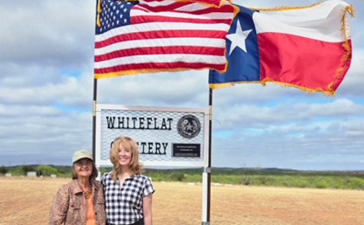 WINDY DAY AT WHITEFLAT Marisue Potts Etheredge (left) and Leesa Ruderman led efforts to secure a Texas Historical Commission historic cemetery medallion. It was installed by Motley County Historical Commission volunteers and dedicated April 11. | COURTESY PHOTO