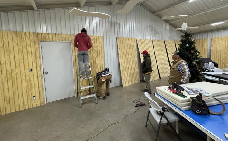 At the First Baptist Church of Guthrie this week, upgrades to interior siding of the fellowship hall were being made by a construction crew headed up by David Garcia of Paducah. Garcia said that finishing out the new wooden paneling all the way around the hall’s perimeter would provide a warmer look and better sound control. | CAPROCK COURIER