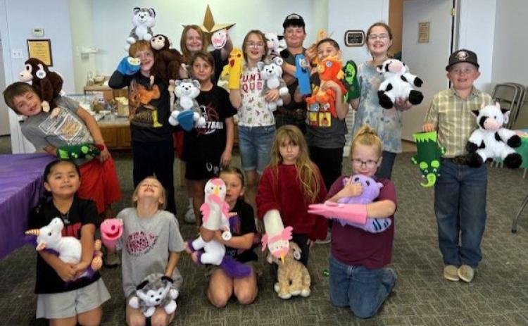 The Motley County Library held a Spring Break Craft Camp last week. Everyone who attended created paintings on Tuesday, including birdhouses, canvas paintings, boxes, flowers, paper dolls and all kinds of art pieces. On Thursday, the library hosted a“Build a Bear”event. Attendees also created hand puppets—followed by presentation of a puppet show. | COURTESY PHOTOS