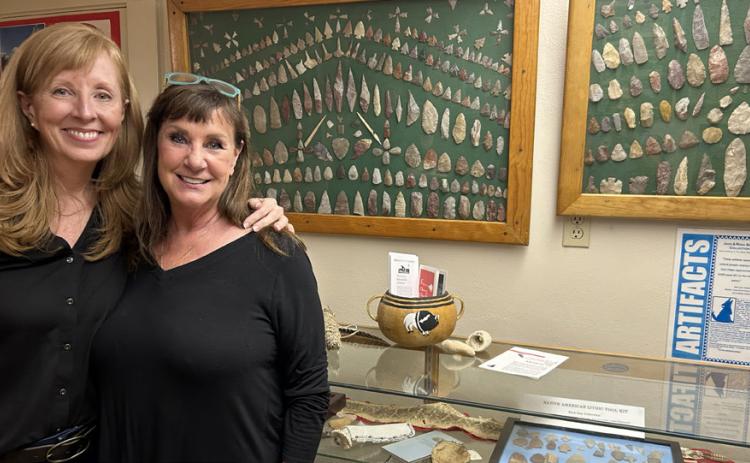 MARKER MAVENS Leesa Ruderman (left, with Rhonda Spray exploring the Jack and Rosa Spray family artifact collection at the Motley County Museum) encourages donations to offset the cost of a historical marker for the Whiteflat Cemetery. Call her at (301) 639-6369 if you can help. | COURTESY PHOTO