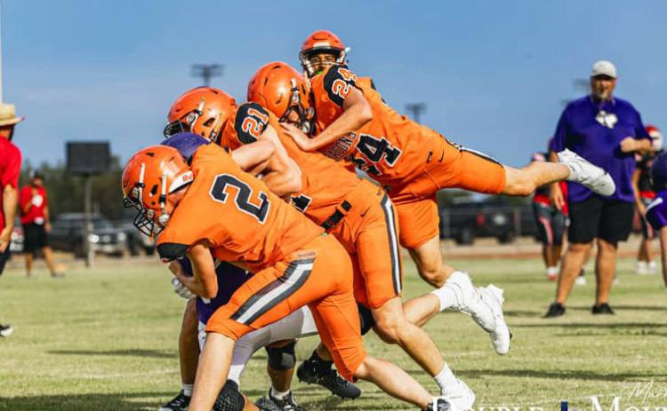 The Paducah Dragons traveled to Aspermont last week for their final scrimmage of the year before regular season play gets underway. Shown here are the Dragons doing battle with theThrockmorton Greyhounds. | DOUBLE MOUNTAIN CHRONICLE PHOTO