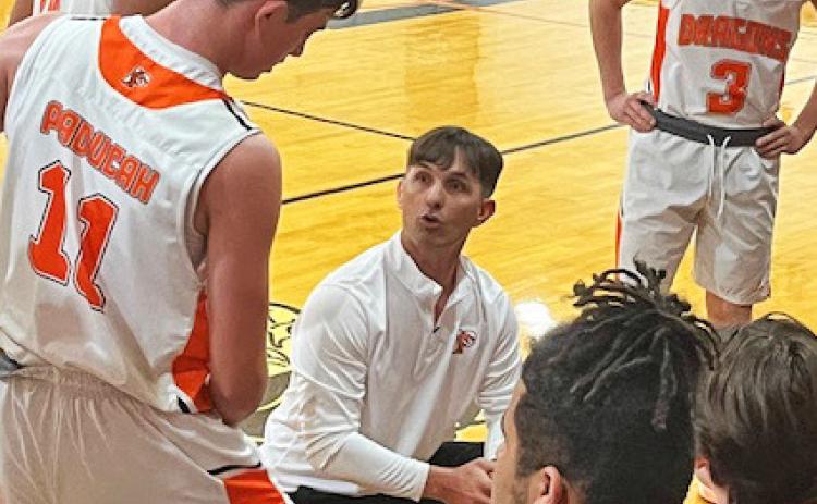 TIMMONS TIME OUT Paducah head coach Casey Timmons called a time out with Dragons Caler Timmons, Darren Mackey, Cyler Timmons at the Aspermont Tournament last weekend. | CAPROCK COURIER