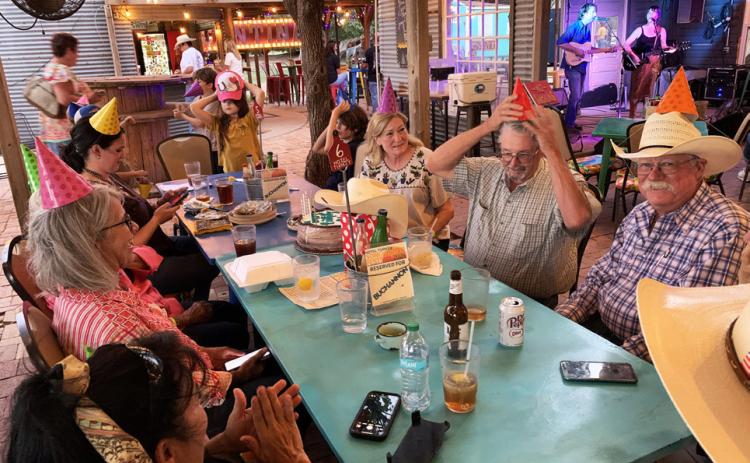 THE BACK PORCH at Hotel Turkey is an ideal locale for a birthday celebration amid the musical delights of the hotel’s third annual Songwriter Festival.