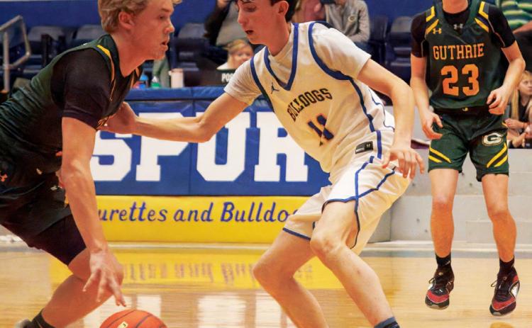 JAGS FALL The Guthrie Jaguars varsity boys basketball team took a couple of tough losses last week, falling to the Spur Bulldogs 49-- 39 and the Valley Patriots 71-34. | COURTEY PHOTO