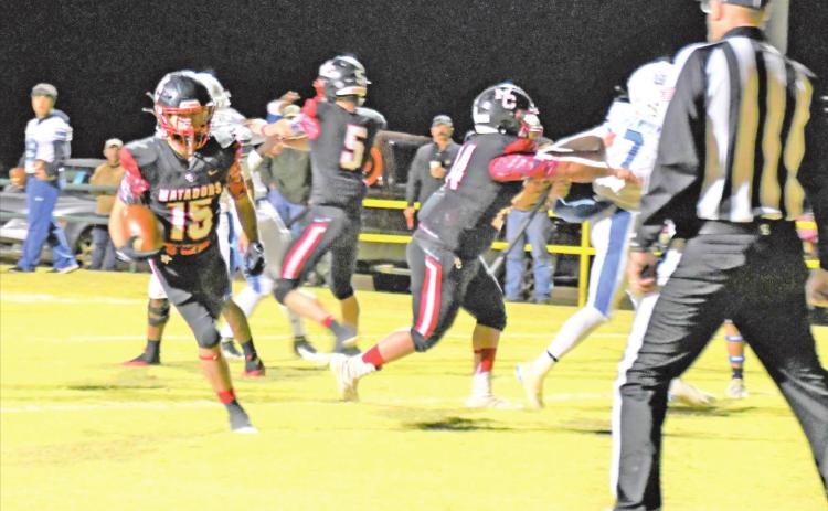 END ZONE BOUND Kason Degan of the Motley County Matadors rushes toward a touchdown in the Motley County– Rule bi-district playoff game in Guthrie Friday. The Matadors won 52–6, qualifying for their 12th regional quarterfinals playoff. They face Balmorhea Thursday, Nov. 18 at 6:30 p.m. in Grady, Texas. | COURTNEY MENDOLA PHOTO