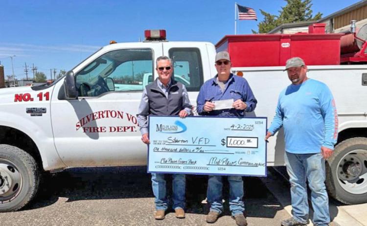 FIRE FUNDS Mid-PlainsCommunicationsrecentlymadedonations to six area fire departments. From left are Dusty George, Mid-Plains CEO/General Manager; Silverton Fire Chief JoDee Robinson; and Jared Francis. | COURTESY PHOTO