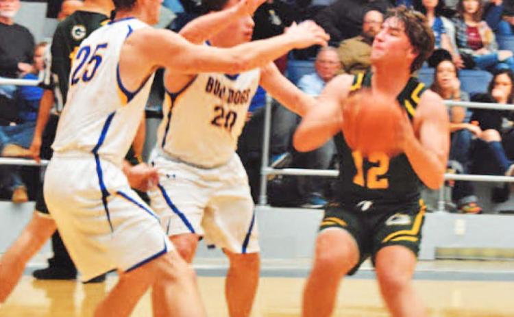 GUTHRIE IN PLAYOFFS? The Guthrie Jaguars defeated the Spur Bulldogs 59–46 Friday night and created a traffic jam in the district standings with three teams—Guthrie, Paducah and Spur—vying for the two playoff spots behind district leader Jayton. Guthrie must play all of their district rivals again in the second round. | COURTESY PHOTO