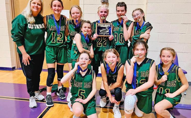 TOURNEY CHAMPS The Guthrie Junior High girls basketball team won the Munday tournament last week. | COURTESY PHOTO