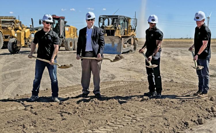 EARTH AND SKY Representatives of Soluna Computing, including CEO John Belizaire (second from right), turned over ceremonial shovels of dirt at a groundbreaking ceremony last Wednesday for phase 2 of the firm’s data center in Briscoe County. As the cameras clicked, a gust of wind behind the men churned into a small landspout, which quickly dissipated. We’ll have more on what Soluna’s data processing means for Briscoe County in next week’s issue. | CAPROCK COURIER