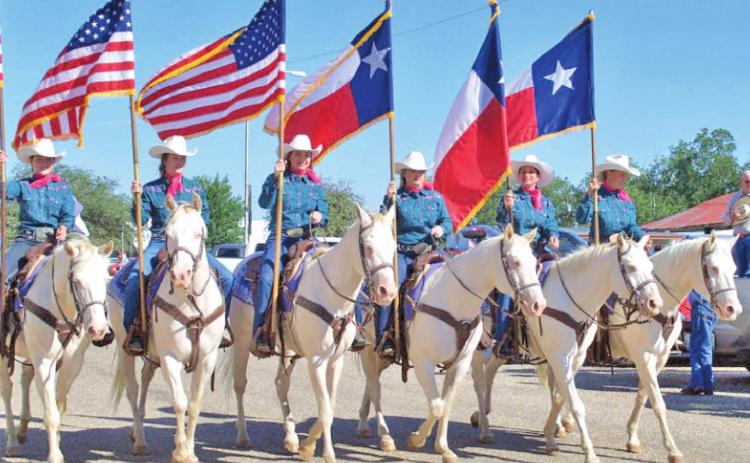 RIDING WHITE HORSES The Six White Horses team from Hardin-Simmons University in Abilene has been a perennial favorite in the Motley-Dickens Old Settlers Reunion and Rodeo parade. The parade is set for Saturday at 10 a.m. | TEXAS SPUR PHOTO