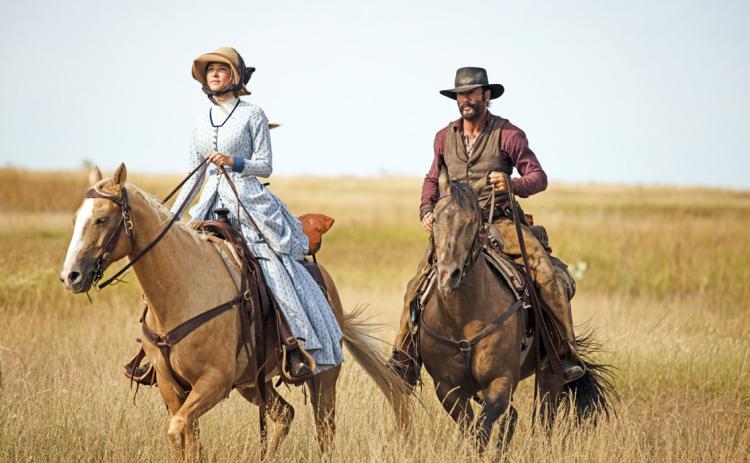 HOWTHEWESTWASWORN Costumes pictured on Elsa Dutton (Isabel May) and James Dutton (Tim McGraw) from the hit TV series‘1883’are on display at the National Ranching Heritage Center. | PHOTOGRAPH COURTESY OF 101 STUDIOS AND PARAMOUNT+