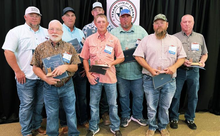MOTLEY HONORS Motley County Highway Department maintenancecrew, including Scott Fulton, Crawford Mason, GarySimpson, Terry Simpson, Jerry Jones, Matthew Woolsey, Reagan Elliott, Hall Martin, David Stafford, Sammy Hutchison and John Jones, were honored at the annual Texans Caring for Texans ceremony on the campus ofWestTexas A&amp;M University in Canyon last week. They were specifically recognized for their work during last year’s tornado. | TXDOT PHOTO
